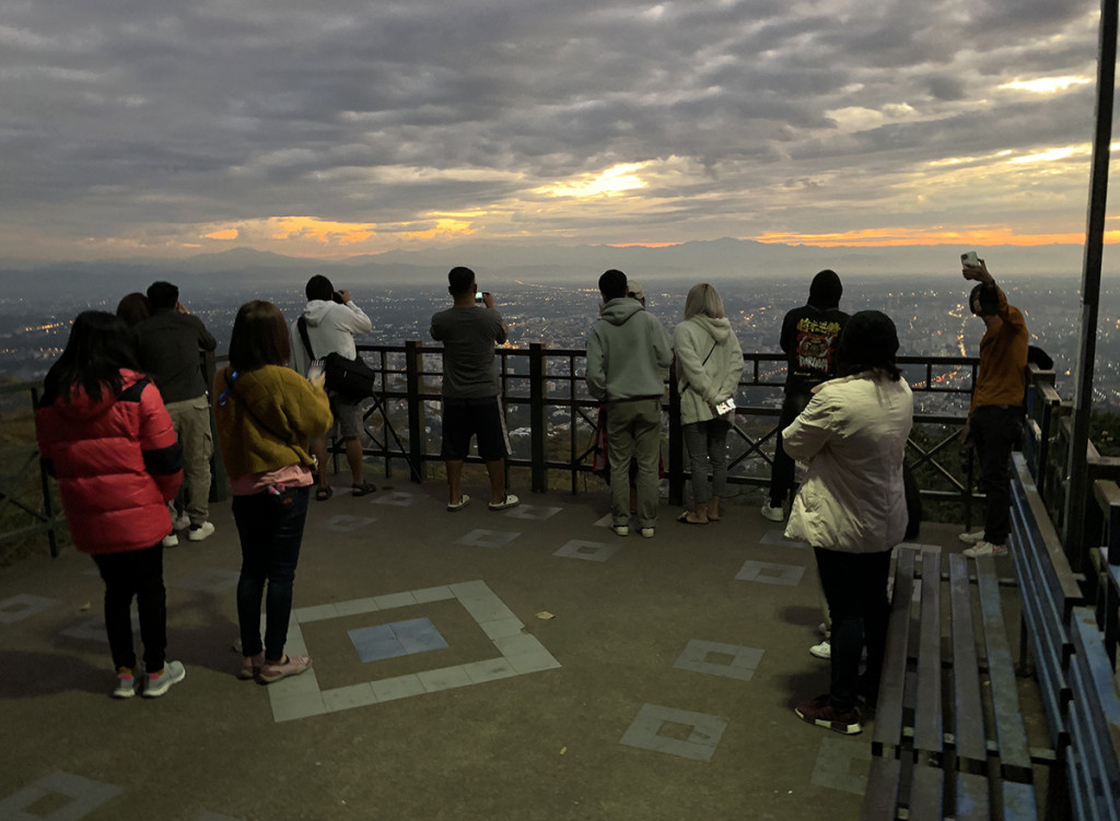 At the lookout, about halfway up to Wat Doi Suthep. Notice all the think jackets and sweaters. It was in the mid 60's.